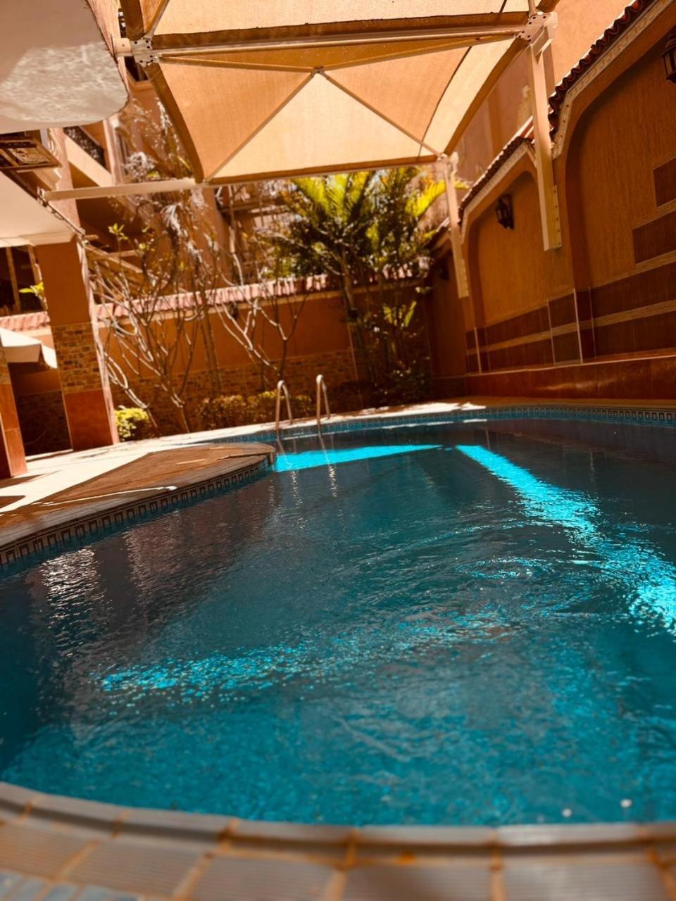 Ferienwohnung Hidden Gem With Pool Access In New Kairo Exterior foto